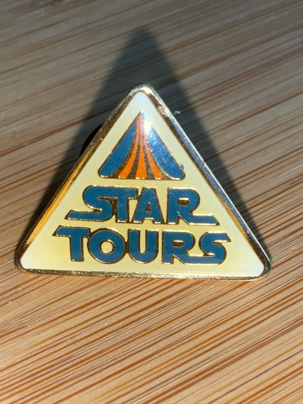 VINTAGE 1986 Disney pin for Star Tours opening (ivory)- Yellow & Blue